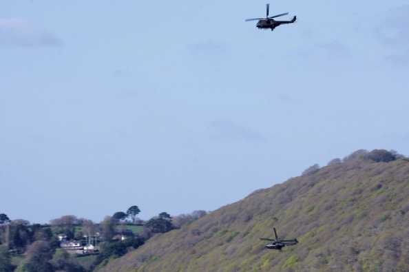 14 April 2020 - 16-34-19 
And if the Wildcat was a surprise, this was a double, double delight. Two RAF Puma's on exercise, one of them landing on a private landing zone over above Bridge Road, Kingswear. It looks like some people were expecting the,. Now I wonder who that could be ?
--------------------
RAF Puma helicopters ZA935 & XW232 
Over Dartmouth & Kingswear